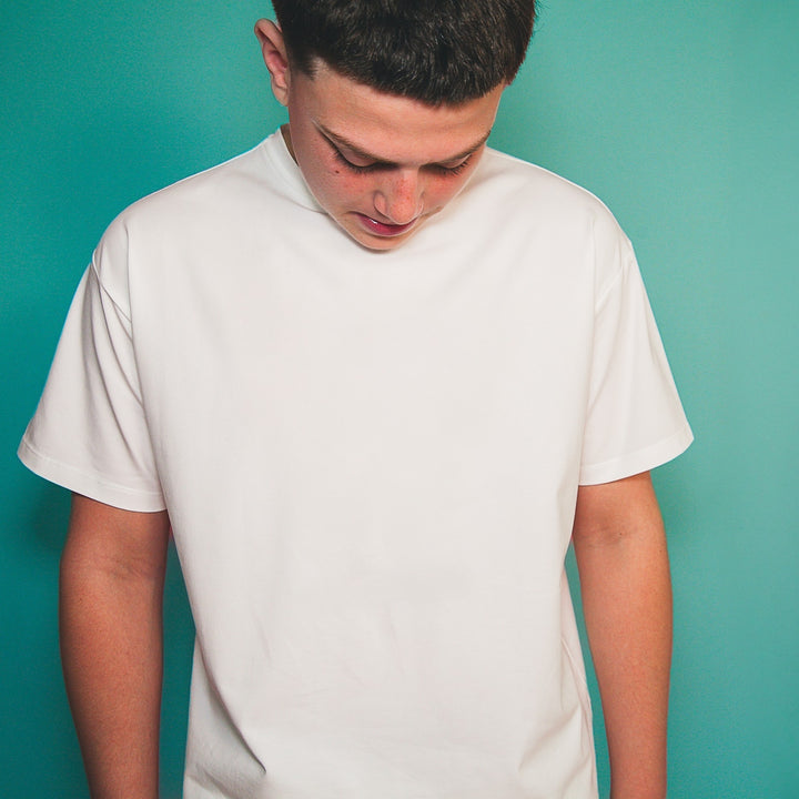 Custom white t-shirt for kids showcasing personalization options in Dubai
