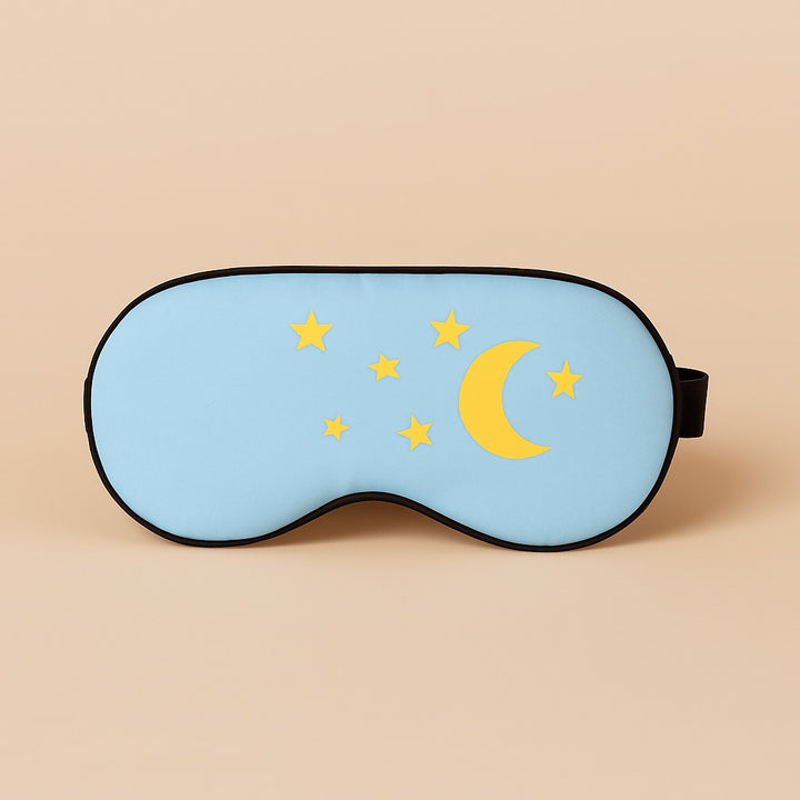 Personalized sleep mask in light blue with yellow moon and stars design for a good night's rest