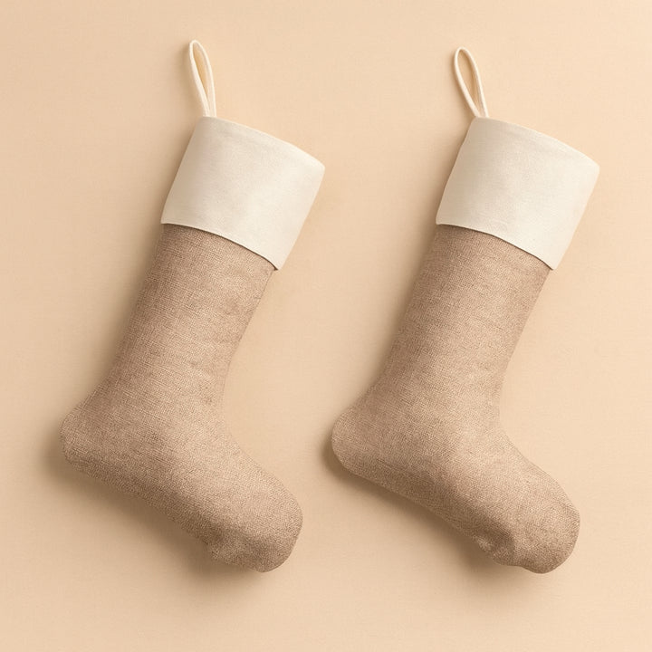 Two rustic Christmas stockings for mantle in beige with white cuffs, perfect for holiday decor