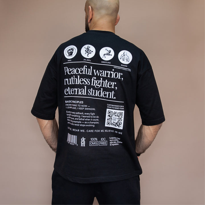 Custom statement oversized tee with unique graphic design and inspirational text on the back