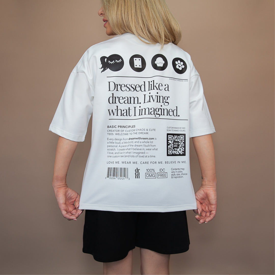 Custom white statement oversized tee with unique graphic design and inspirational text on the back