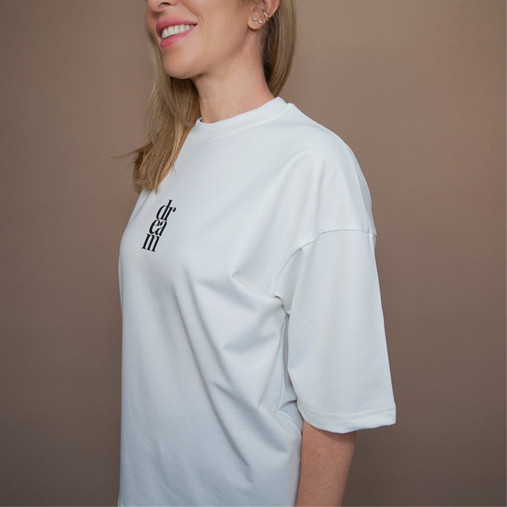 White statement oversized tee from dreamwithreem with a stylish logo design on the front