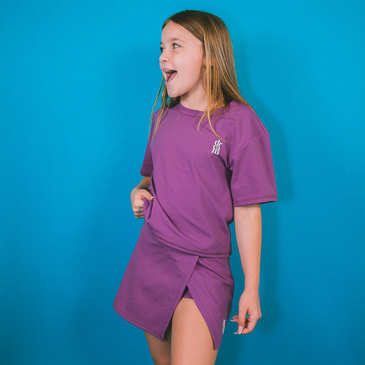 Girl wearing a purple stylish girls skorts outfit by dreamwithreem against blue background