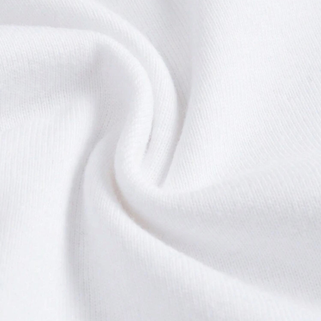 Soft white cotton knit fabric closeup showing stretch and breathable texture for personalized infant bodysuit