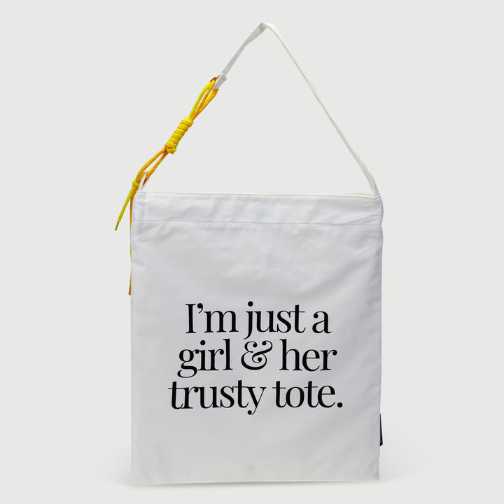 White unique girl tote bag with black text and yellow strap detail by dreamwithreem