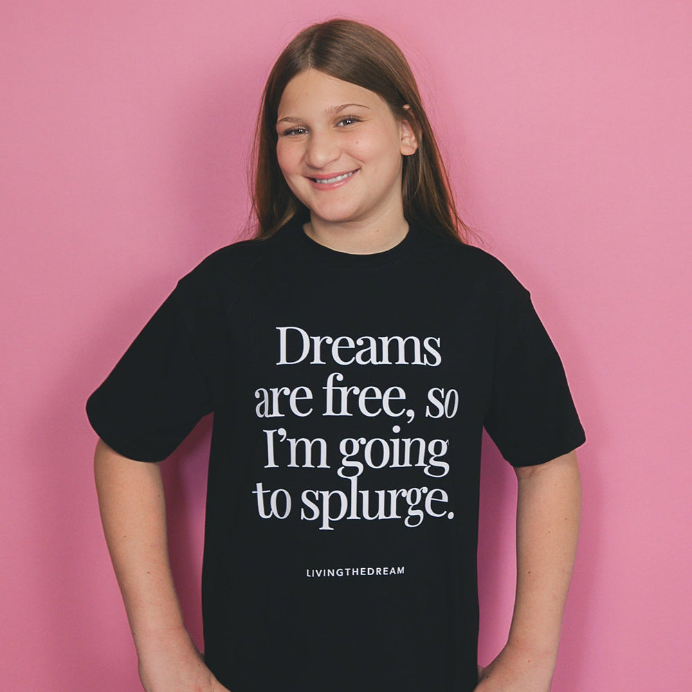 Custom T-shirt from dreamwithreem featuring a unique self-expression tee with motivational text on black fabric