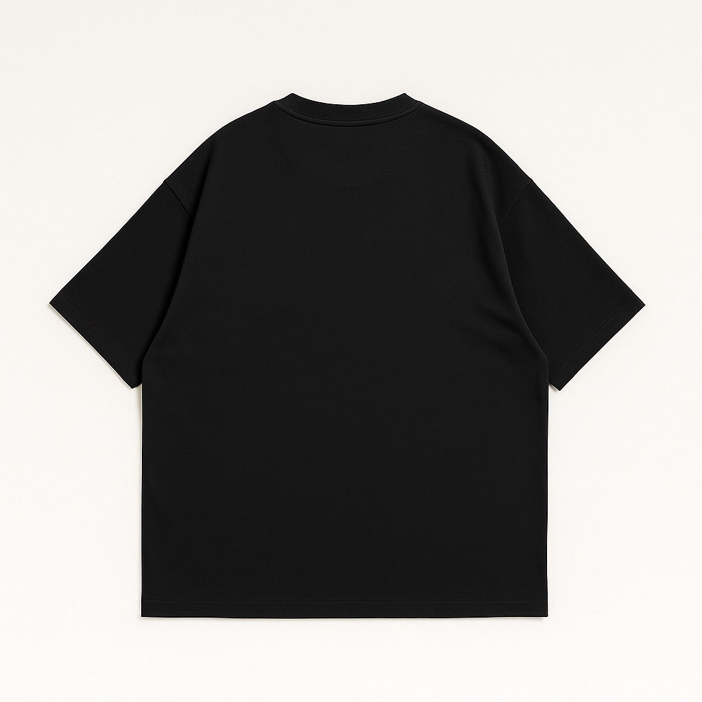 Black custom oversized tee laid flat showing the back with short sleeves and relaxed fit by dreamwithreem