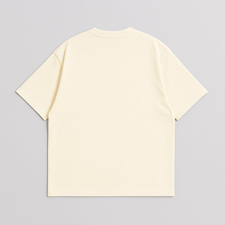 Back view of cream-colored custom oversized tee with short sleeves and relaxed fit